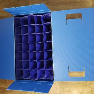 collapsible box with textile compartment